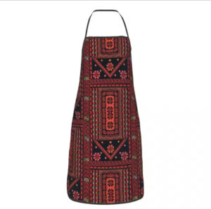 Stijlvolle Palestijnse borduurschort met traditioneel Tatreez-patroon van drie bloemen. Perfect voor koken of als cultureel statement.